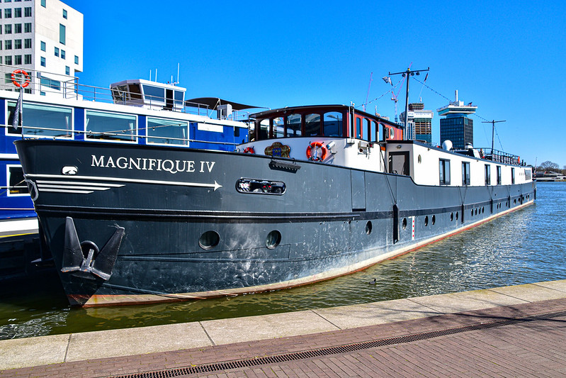 The Magnifique IV drifting down the water offers a luxurious way to travel and view the picturesque Dutch waterways.