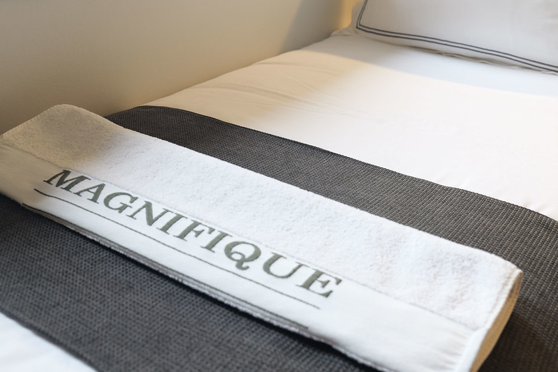 Comfortable beds aboard the privately chartered river barge, Magnifique IV, as it navigates through the picturesque Dutch waterways.