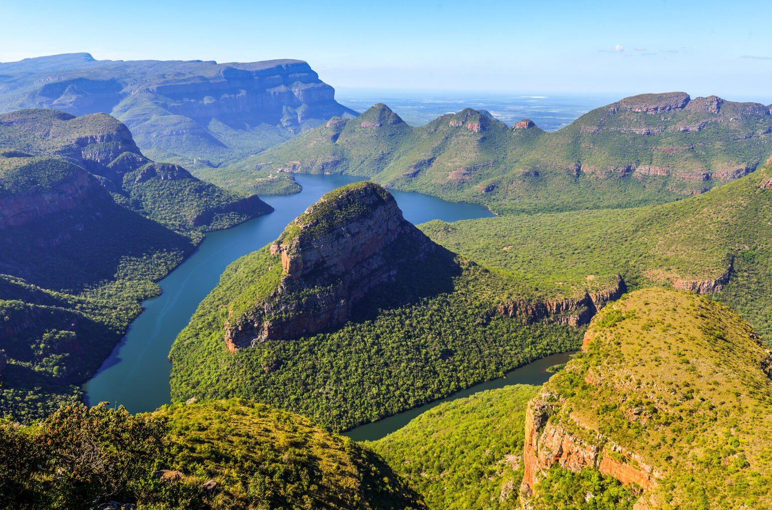 Blyde River Canyon and The Three Rondavels (Three Sisters) in Mpumalanga South Africa. The Blyde River Canyon is the third largest canyon worldwide