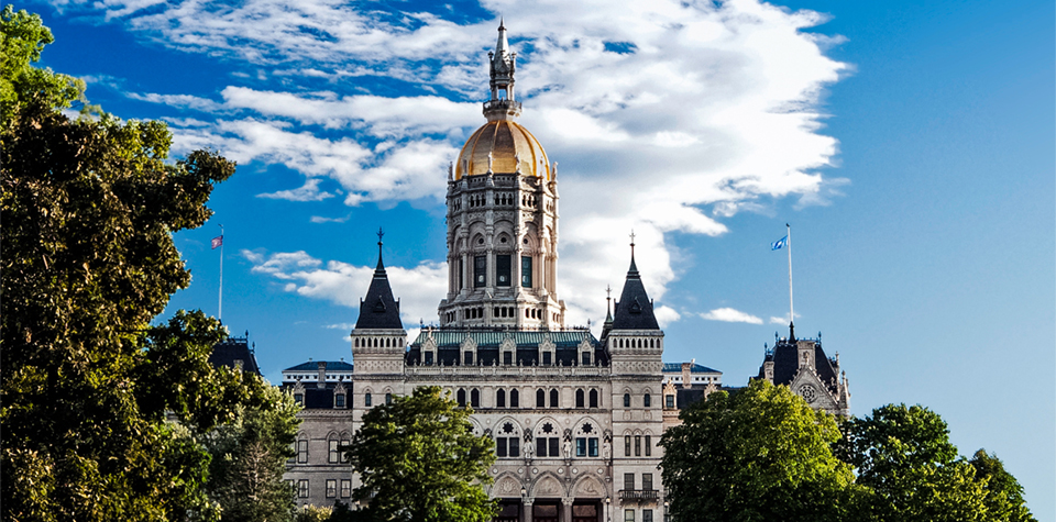 Overlooking Hartford's 41 acre Bushnell Memorial Park, the Connecticut State Capitol was constructed of New England marble and granite and crowned by a gold leaf dome